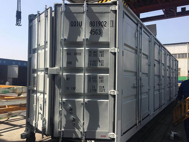 Gray 40ft high cube container with four side doors, end doors marked 45G3 with max gross, tare and net weights