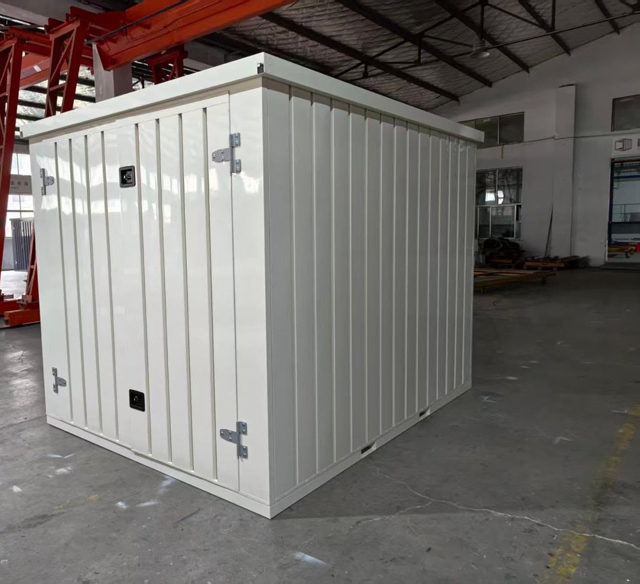 White 10ft pop-up storage container with its double doors closed