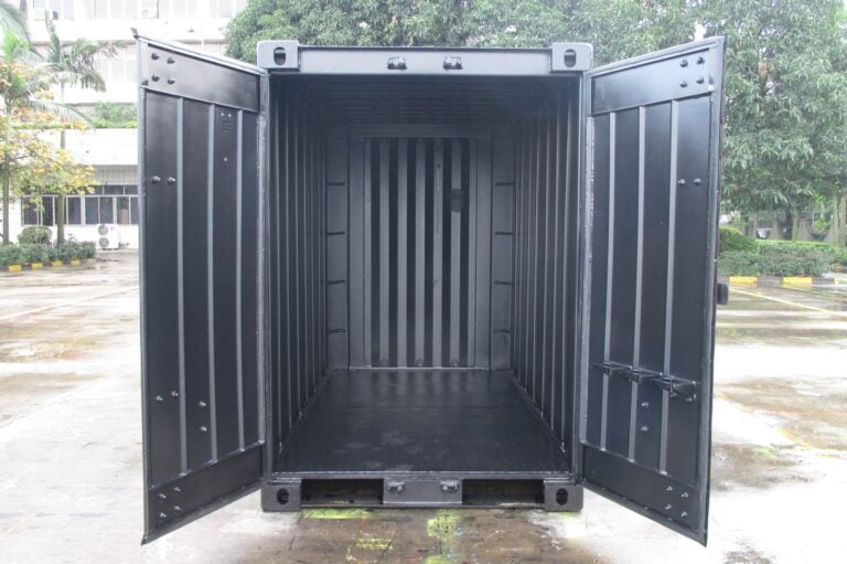 Inside a black QuadCon container with the doors open